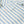 Close-up of a striped shirt with a brand label on a white background
