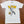 White t-shirt with 'Sun Records' graphic design on a brown surface