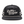 A black trucker-style cap with a flat brim, black mesh back, and white embroidered text reading 'Ramble Provisions' on the front, plus white stripe accents on the sides.