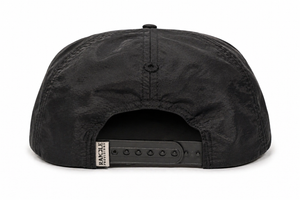 Black cap with a visible brand logo on a white background