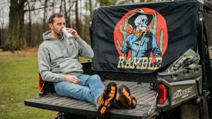 Male model wearing ramble hoodie on a Ranger 4x4 ATV.